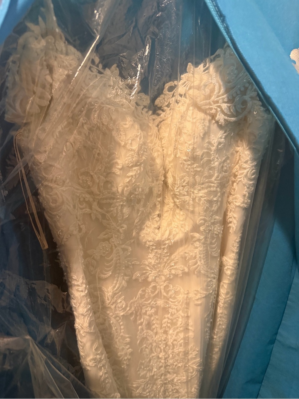 Never Worn Maggie Sottero Ivory Lace Strapless wedding gown.